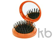mirror with hairbrush